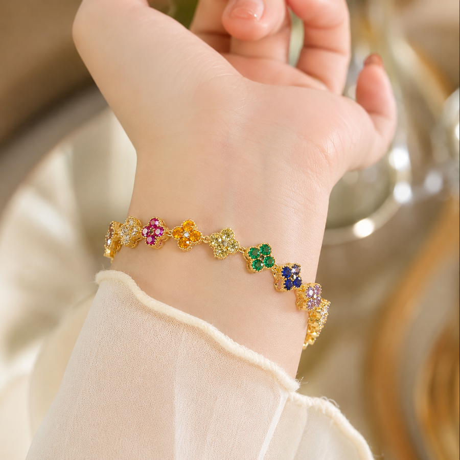 Aloria floral-inspired charm bracelet with crystal accents